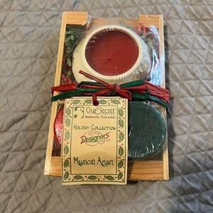 5/ $25 Our Secret Handcrafted Holiday Candles Musician Angel